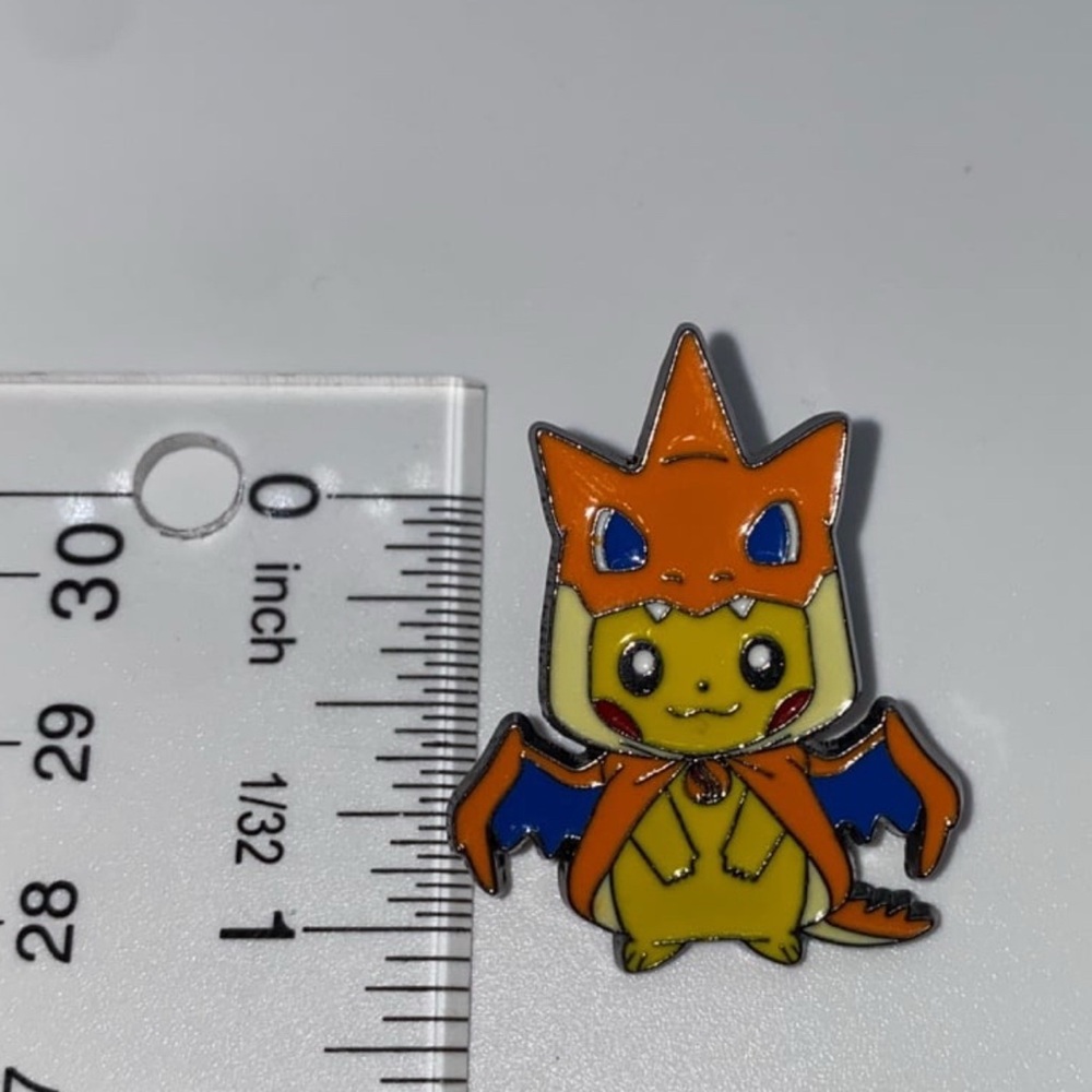Mega Tokyo Japan pikachu charizard poncho pin Brooch brand new 1 inches tall - Picture 3 of 3